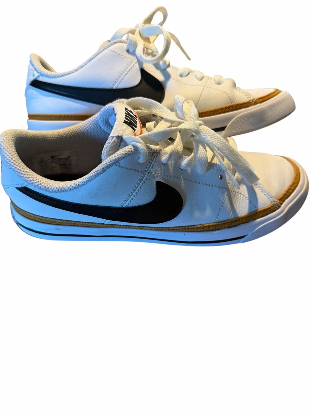 Nike Kids White Sneakers with Black Swoosh and Brown Trim